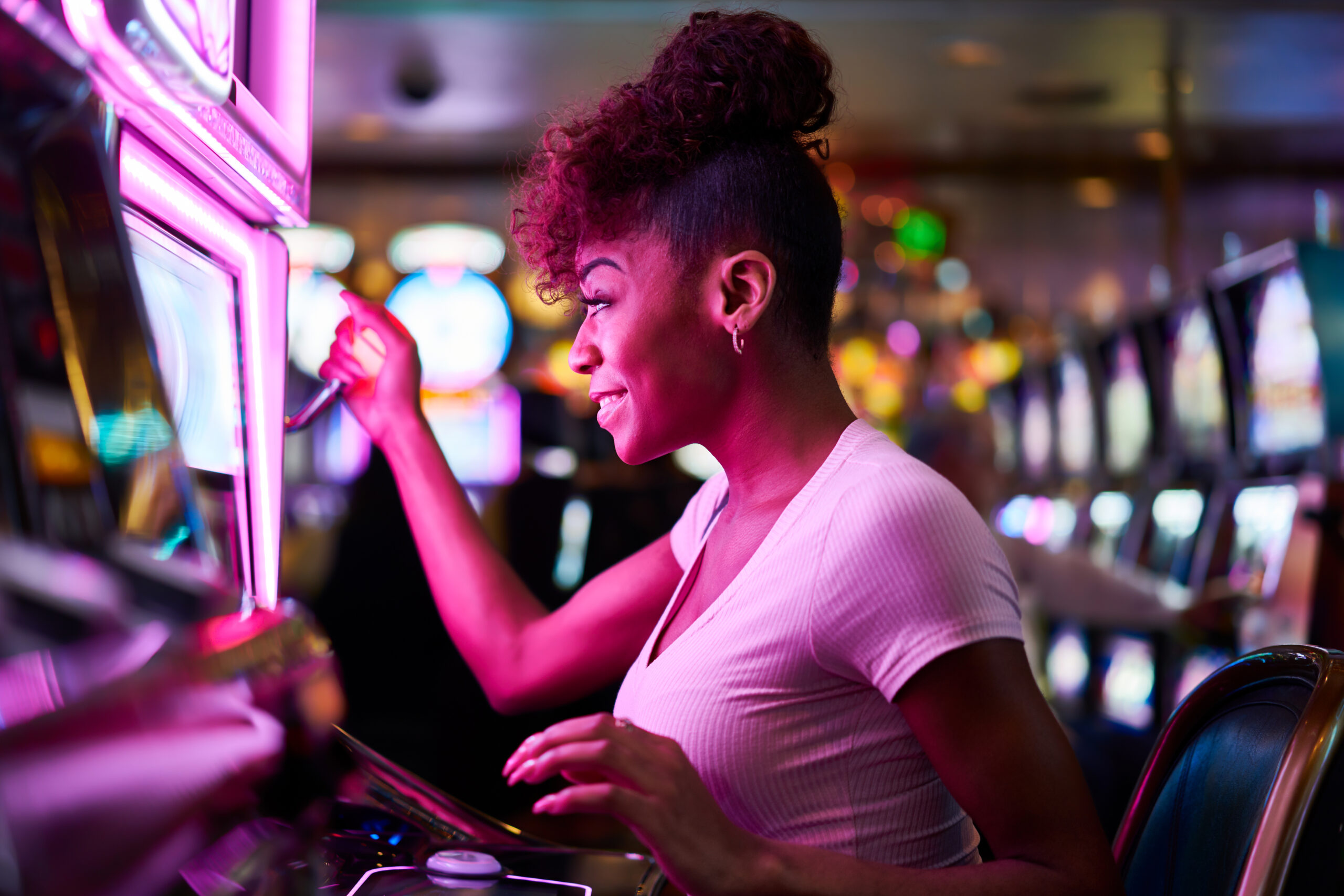 happy woman gambling at casino playing slot machin 2025 04 01 01 30 10 utc_50 scaled