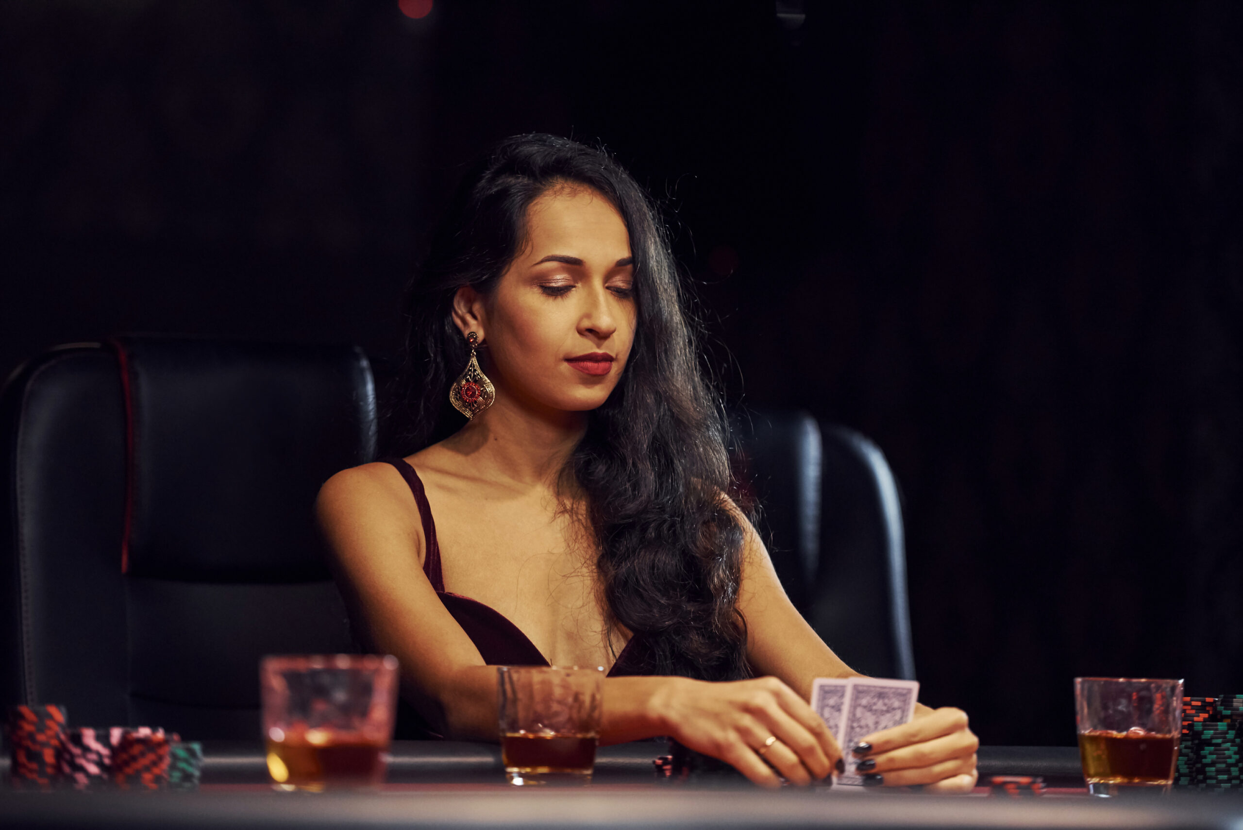 woman in elegant clothes sits in cassino by table 2025 03 18 20 01 21 utc_50 scaled